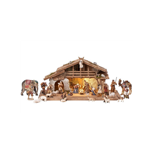 Crèche Kostner 30 pièces dans l'étable alpine