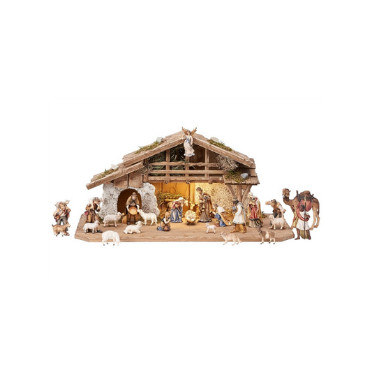 Crèche Kostner 25 pièces dans l'étable alpine